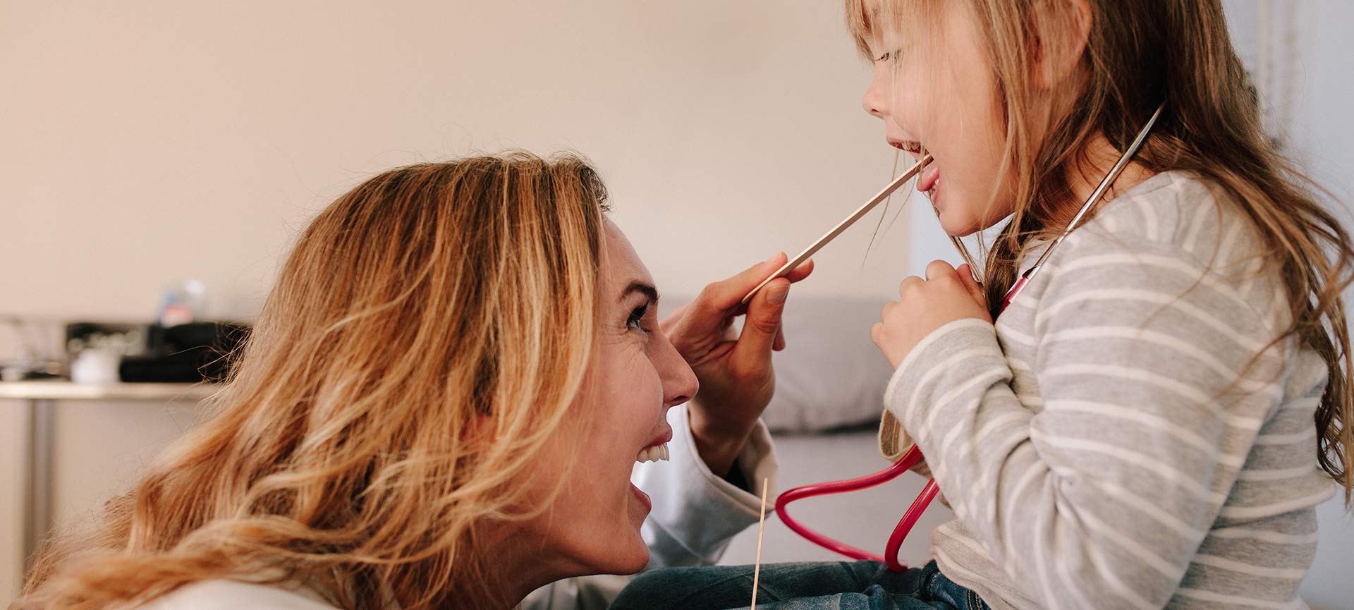 Mother playing with her daughter