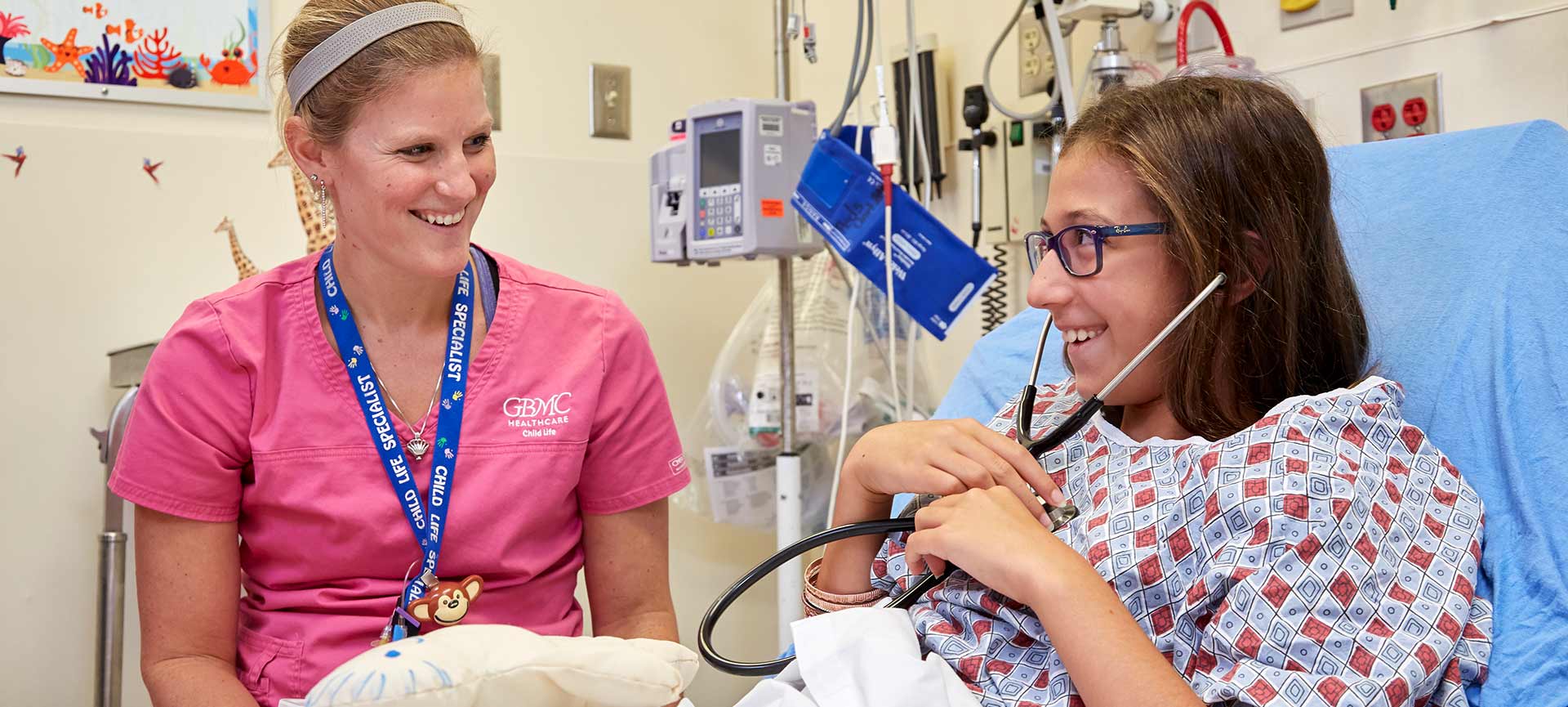 Doctor speaking with patient in bed