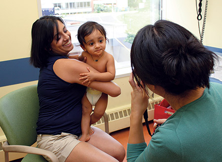 Kian and his mom at a recent checkup with pediatrician Julie Yeh, MD, a member of GBMC’s Cleft Lip and Palate Team.