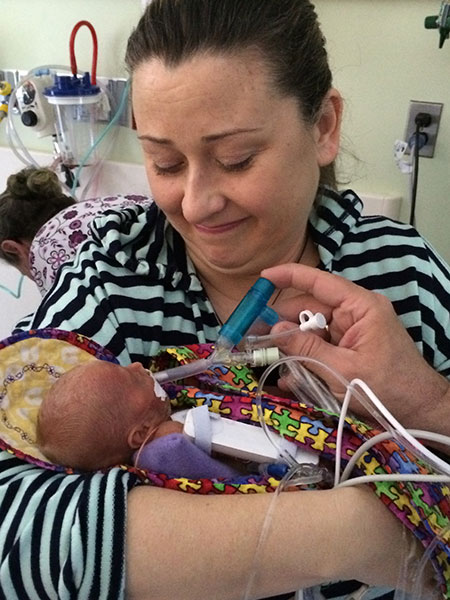 Grayson's mom gets to hold him for the first time